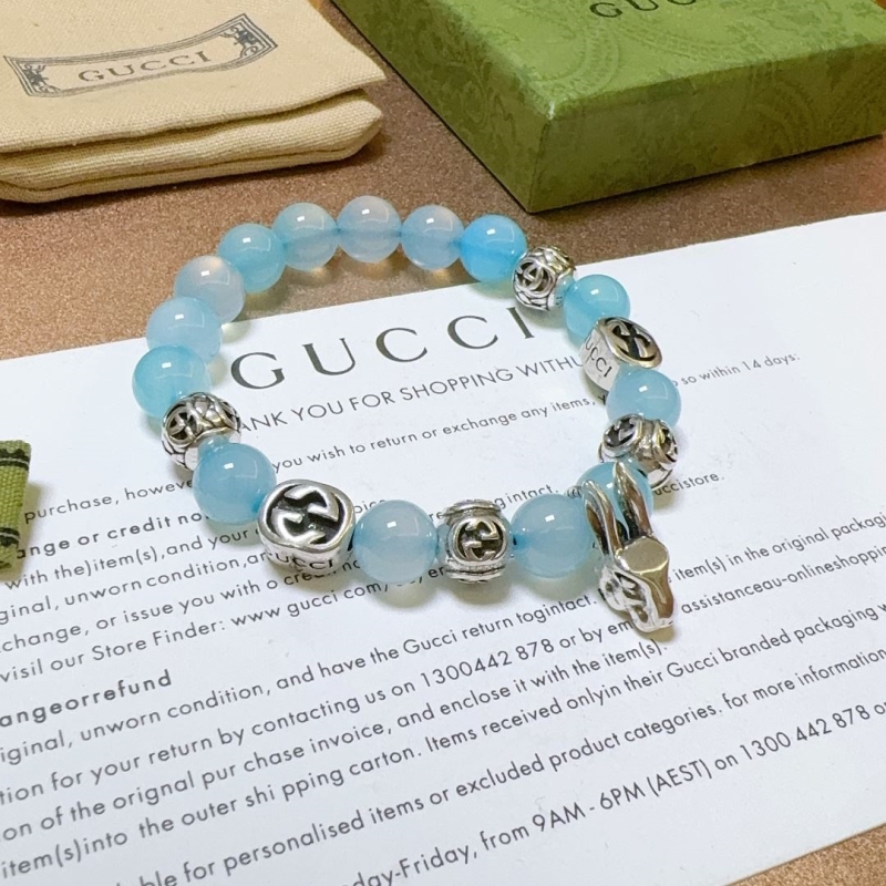 G*u*i bracelets